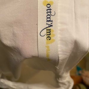 Crisp white oversized peplum blouse